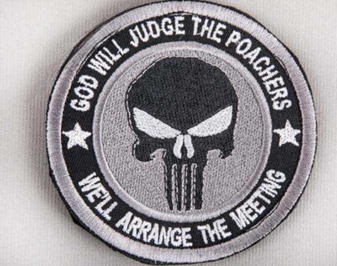 bushveldt god will judge the poachers: badge grey black